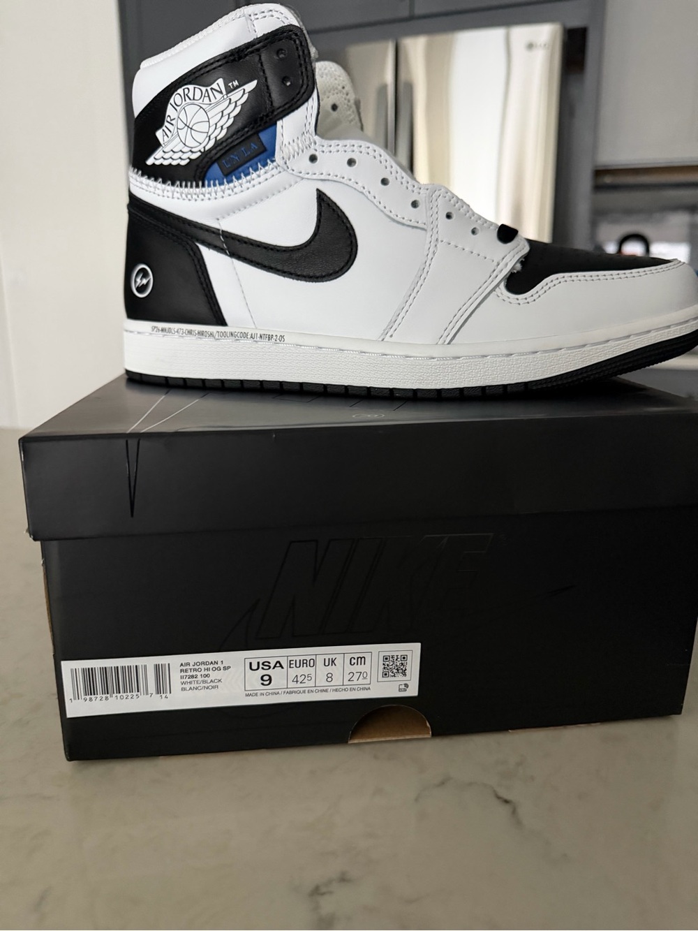 Air Jordan 1 Retro High-Top Sneaker in White and Black